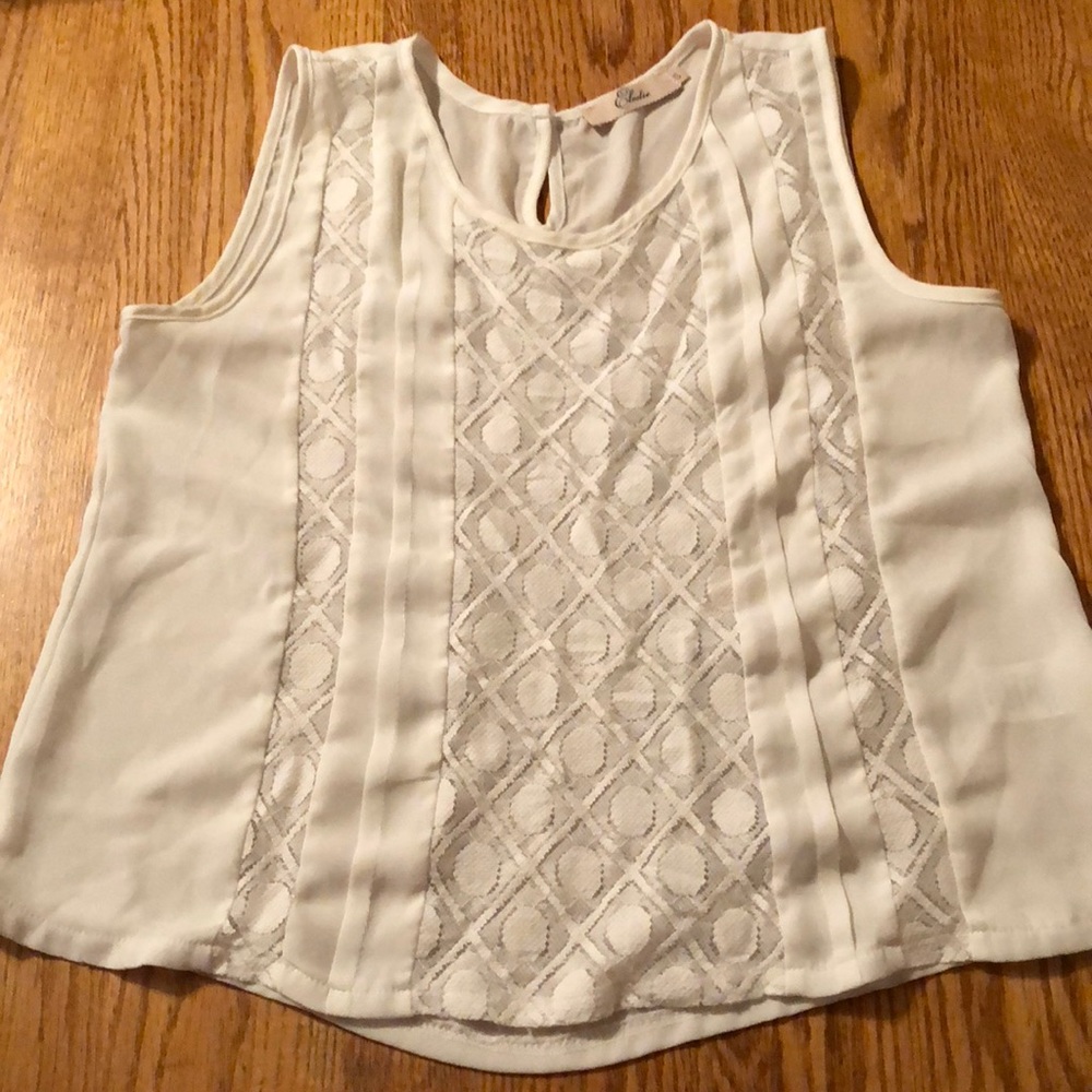 White sleeveless blouse